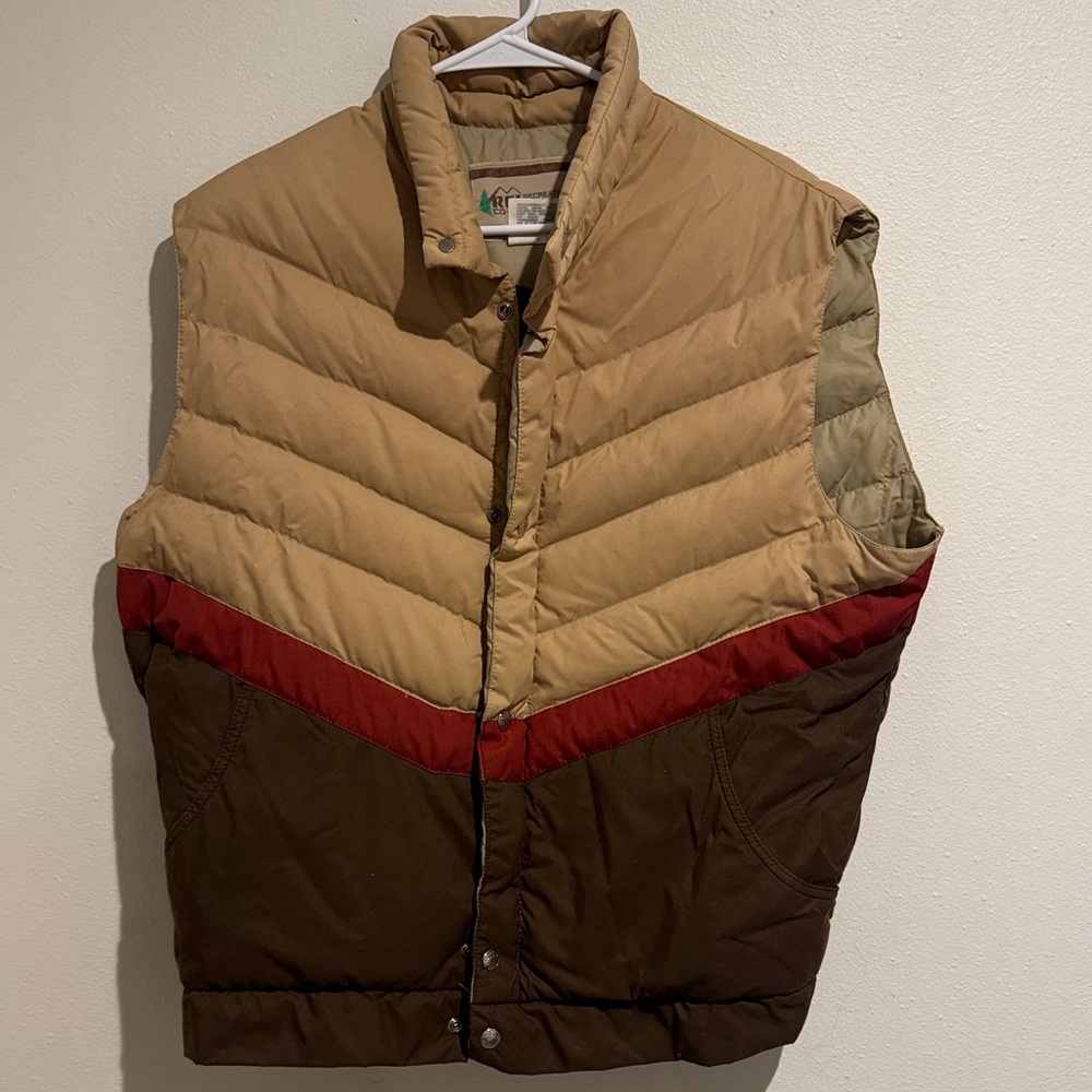 Woman’s tan  and Red Puffer Vest